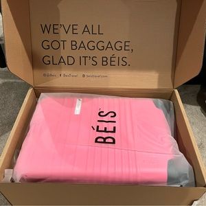 NWT Beis CARRY-ON ROLLER IN BARBIE PINK.
